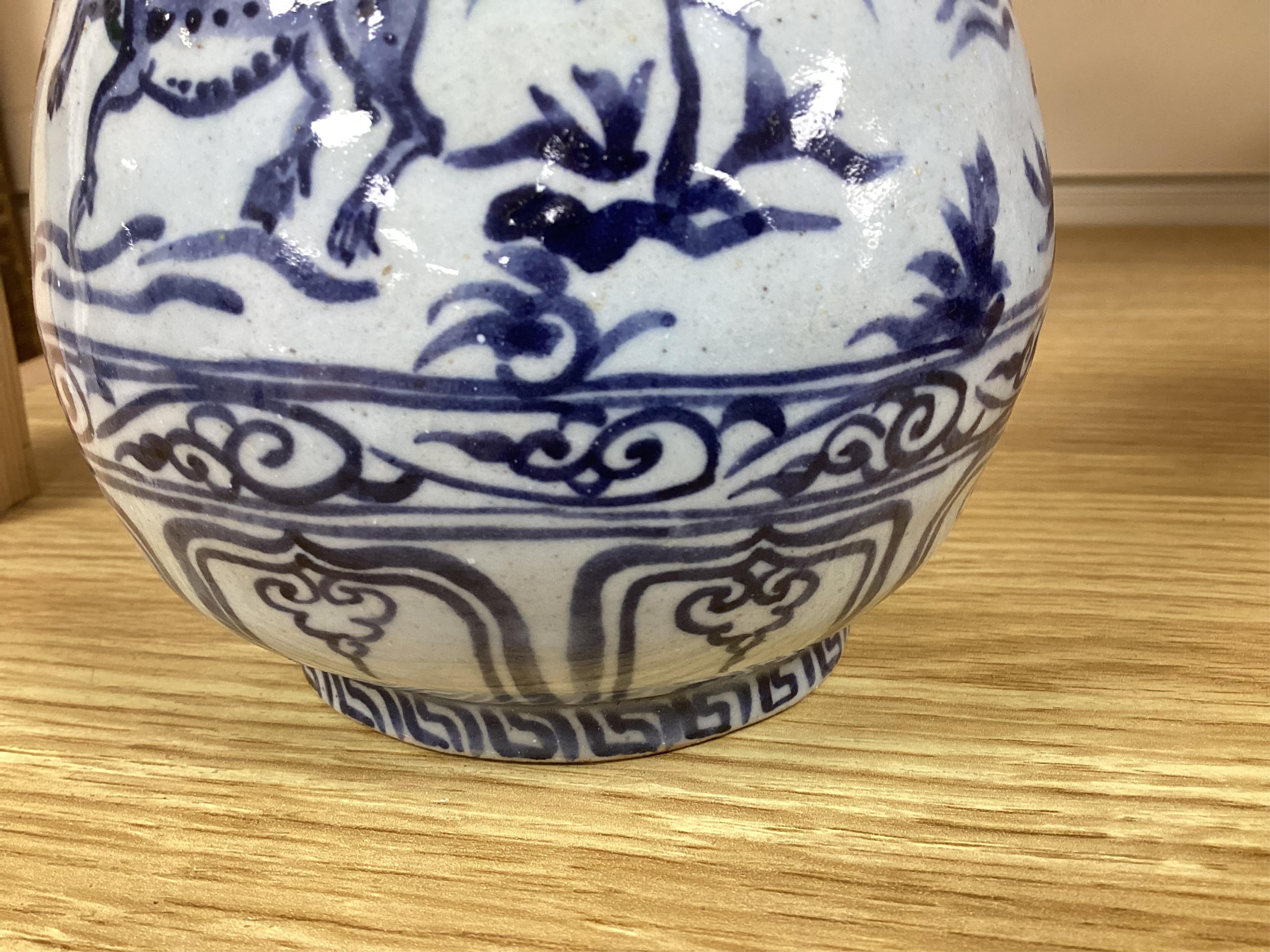 A group Oriental ceramics including Chinese famille rose plates, various tea bowls, a teapot, vases etc., tallest blue and white vase 21.5cm high (28). Condition - fair